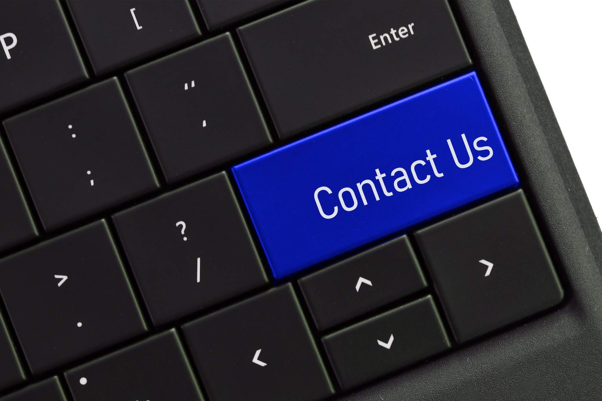 Computer keyboard with a CONTACT US button. Concept - email. phone or social media connection